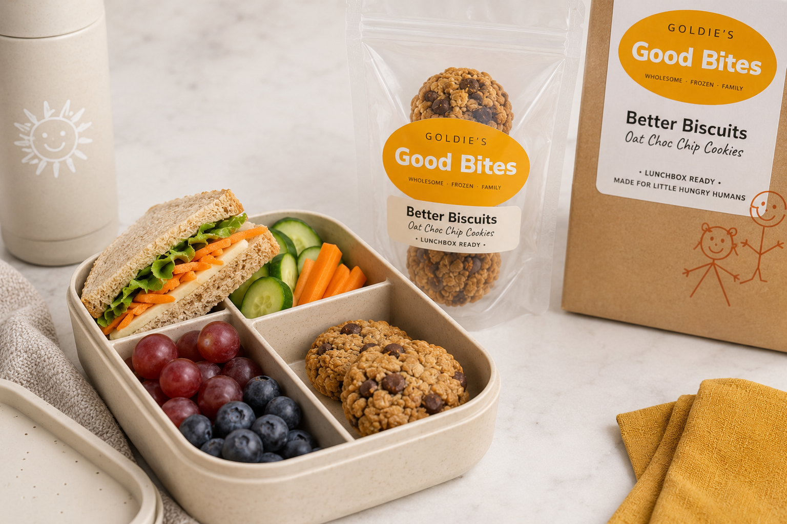 Goldie's Good Bites lunchbox with oat cookies, fruit and veg
